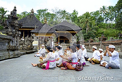 Local People praying at holy spring water temple Pura Tirtha Empul Editorial Stock Photo